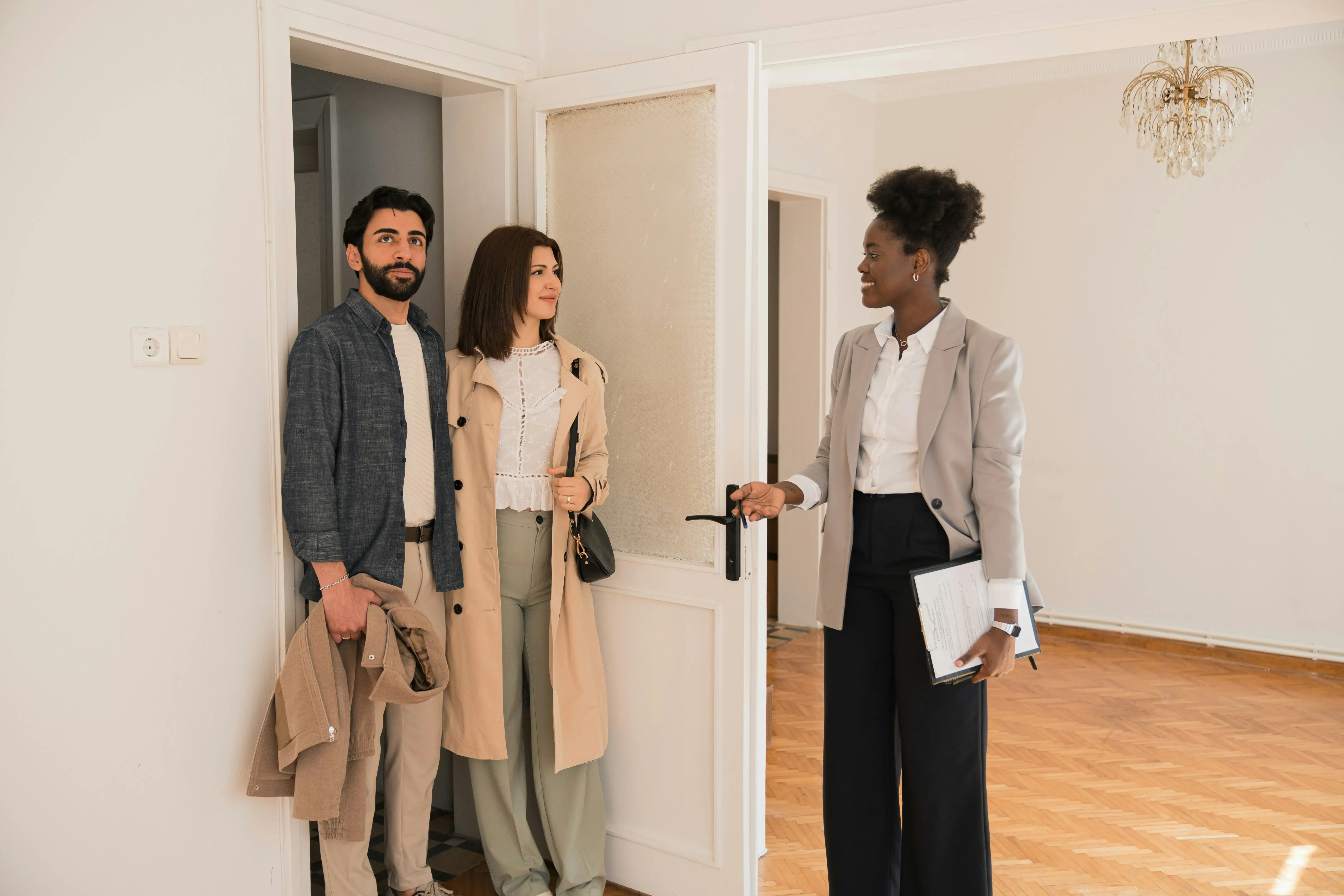 Manager handing keys at a unit